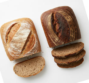 Whole wheat and rye bread loaves