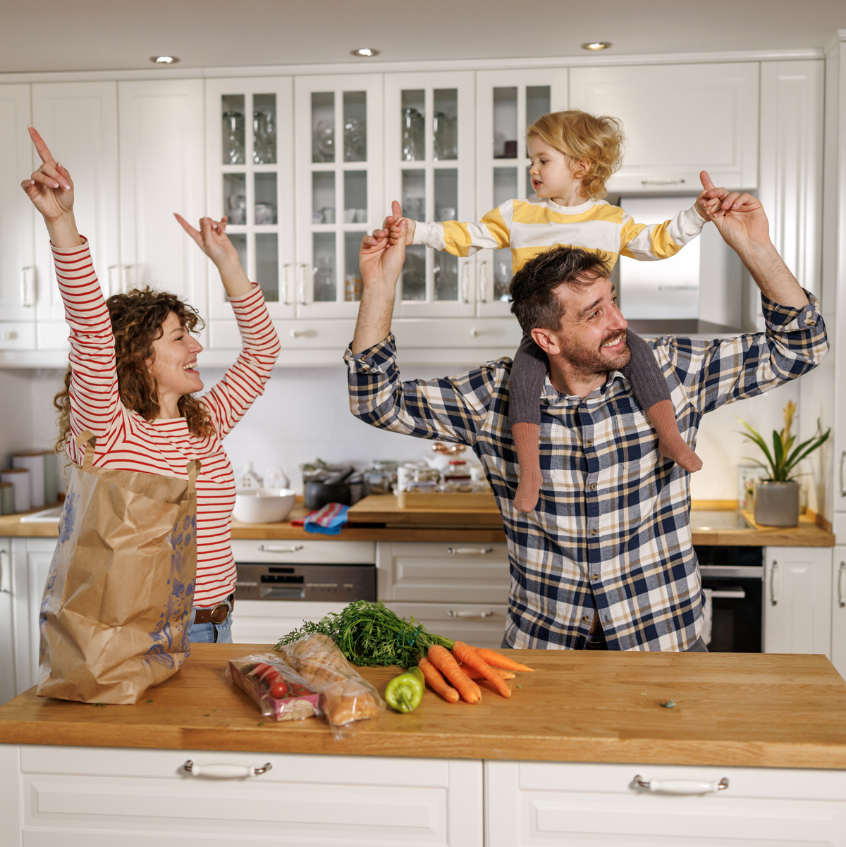 family-dancing-in-kicthen