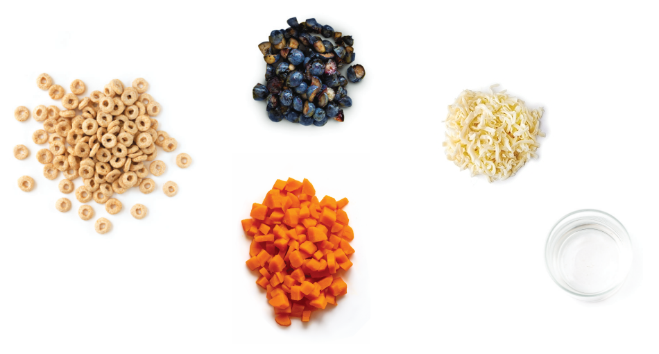 Cereal, blueberries, cheese, carrots, and glass of water.
