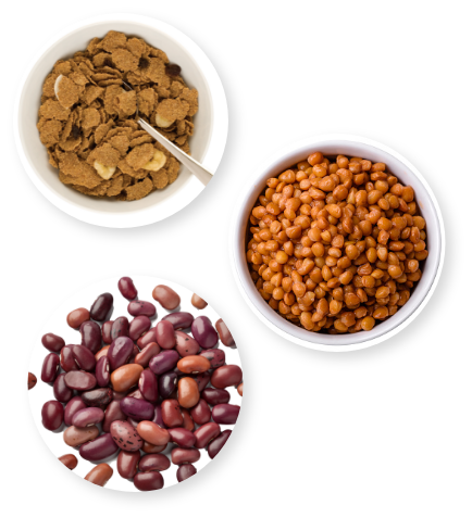 Cereal, baked beans, and beans displayed in bowls.