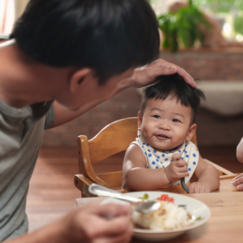father taking care of child