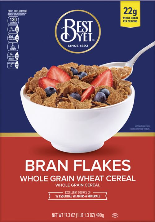 Bran flakes cereal with strawberries and blueberries.