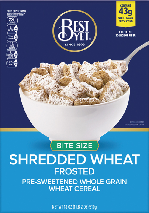 Bowl of frosted shredded wheat cereal with spoon.