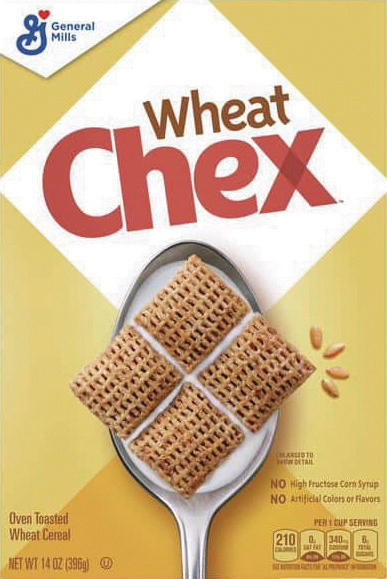 Spoon with Wheat Chex cereal pieces displayed.