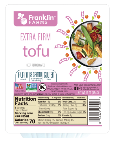 Tofu package with garnish and nutrition facts displayed.