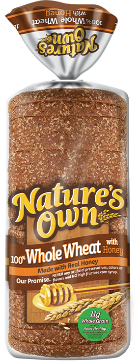 Whole wheat bread loaf with honey, packaged upright.