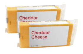 Two blocks of packaged cheddar cheese displayed.