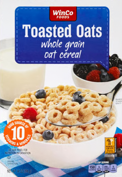 Toasted oats cereal with fresh berries and milk.